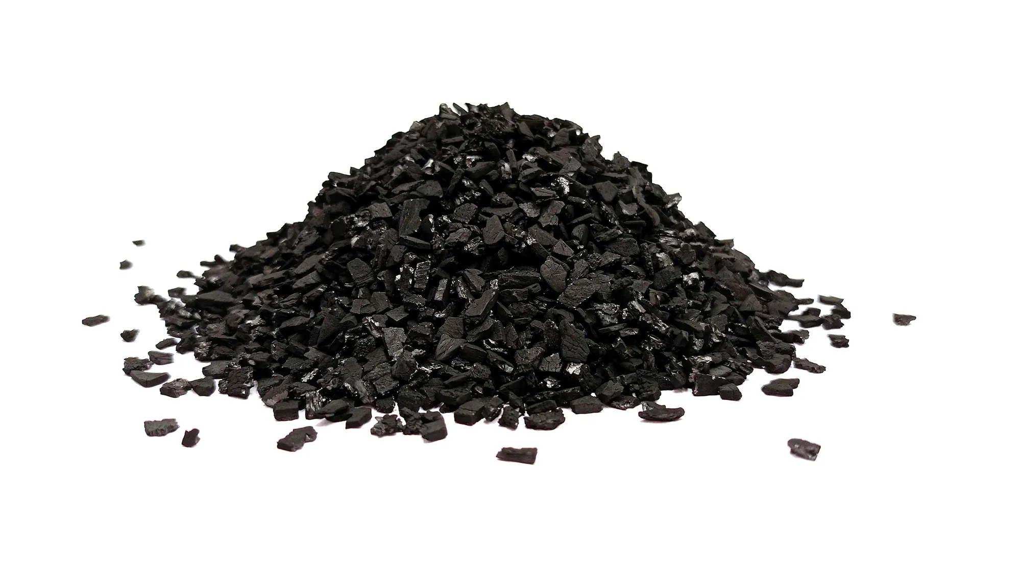Pile of black activated carbon granules
